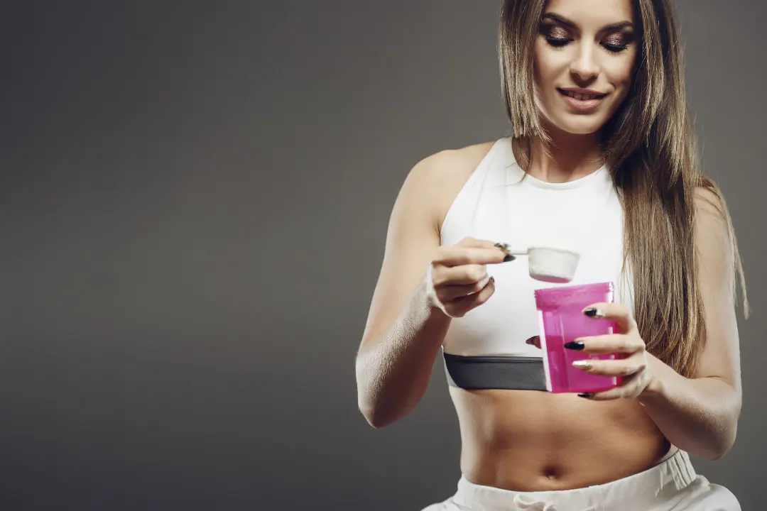Fitness girl with protein shake