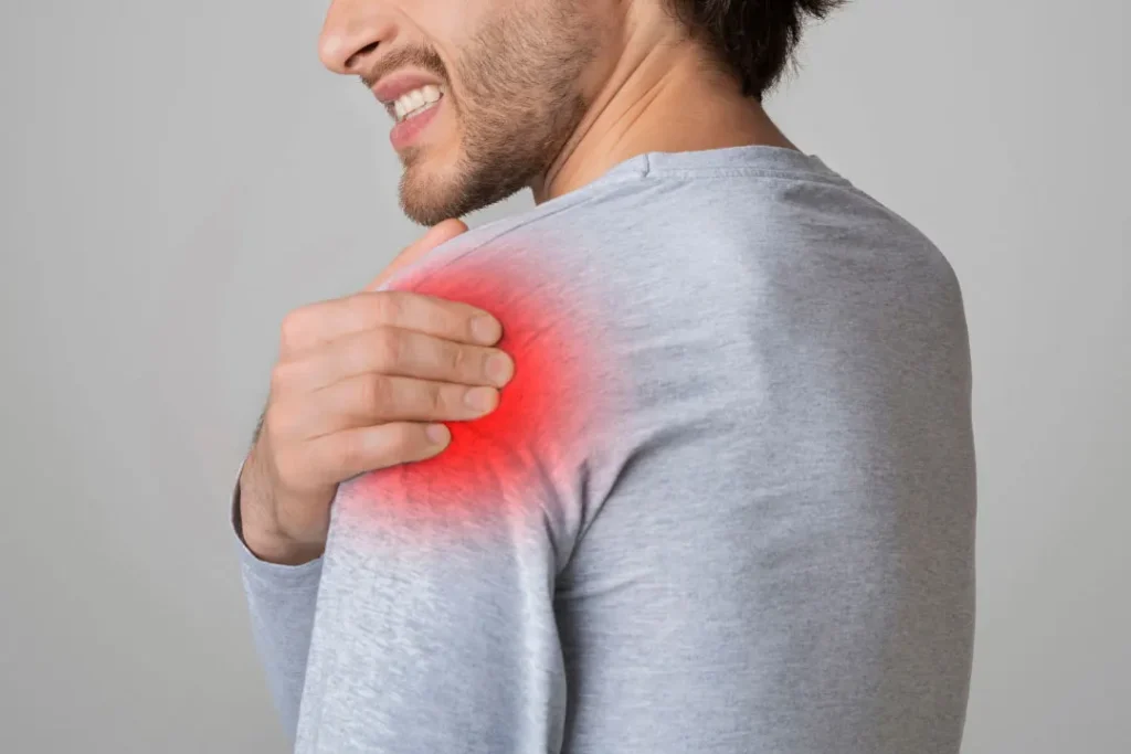 A man having pain in his shoulder. 