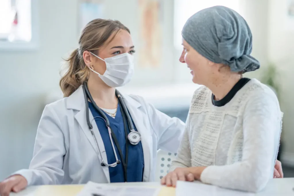 A cancer patient consulting to a doctor. 