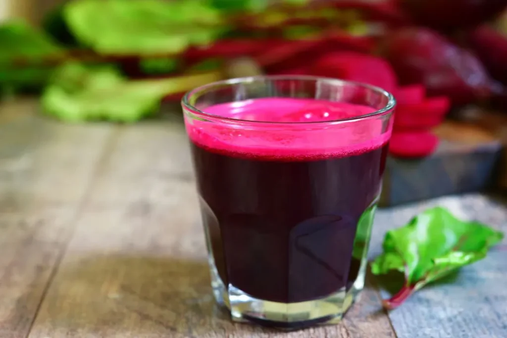 A glass full of beet juice. 