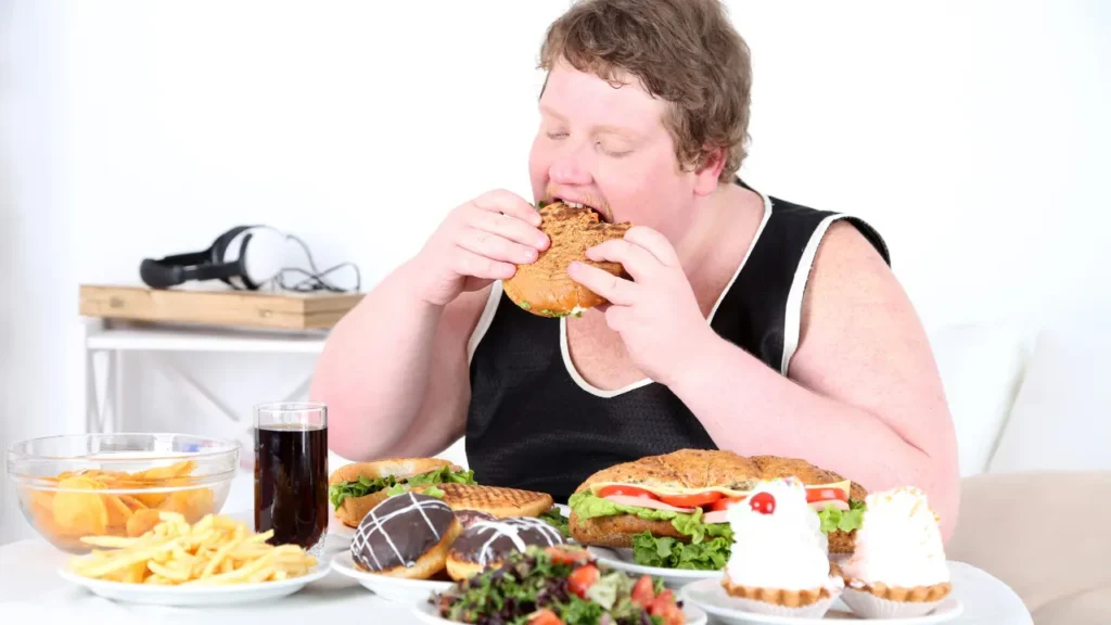 Man having unhealthy diet.