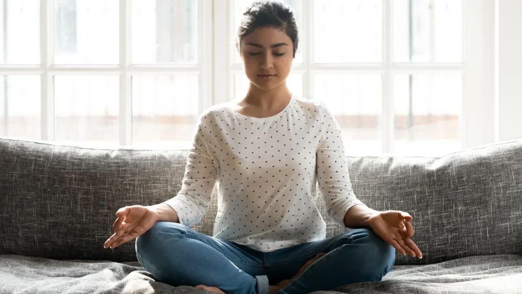 young girl doing meditation for stress relief